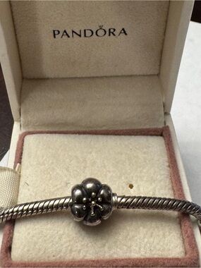 Pandora Silver Flower with 14K Gold Tip Charm.